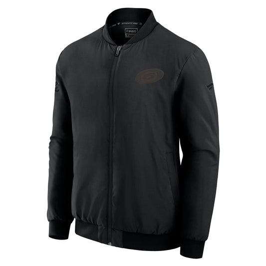 Front: Black bomber jacket with blackout Primary logo on left chest