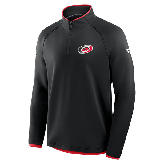Front: Black quarter zip with red trim, Primary logo on left chest