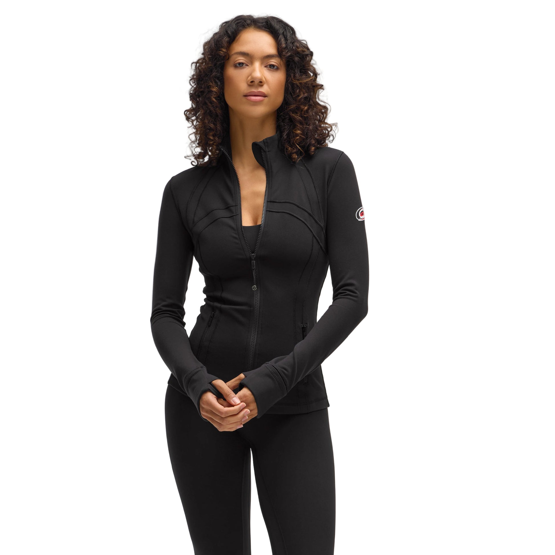 Front: Black zip-up jacket with thumb holes, Hurricanes primary logo on left sleeve