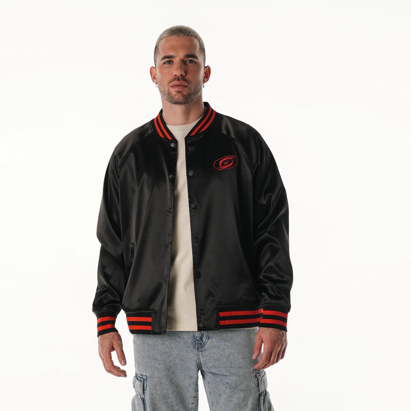 Front: Black satin bomber jacket, Tonal logo on chest, red stripes on neck, waist, wrists