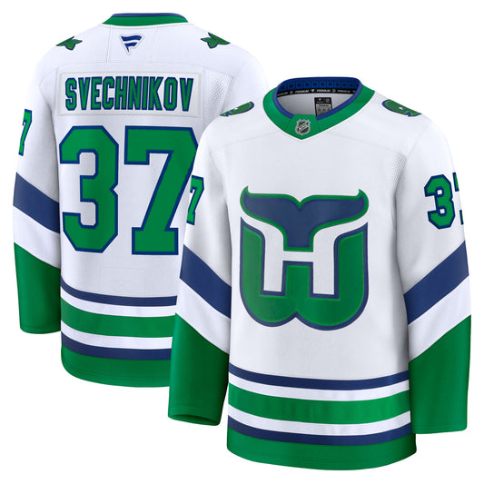 Front/Back: White Whalers jersey, "SVECHNIKOV 37" on back, "37" on sleeves