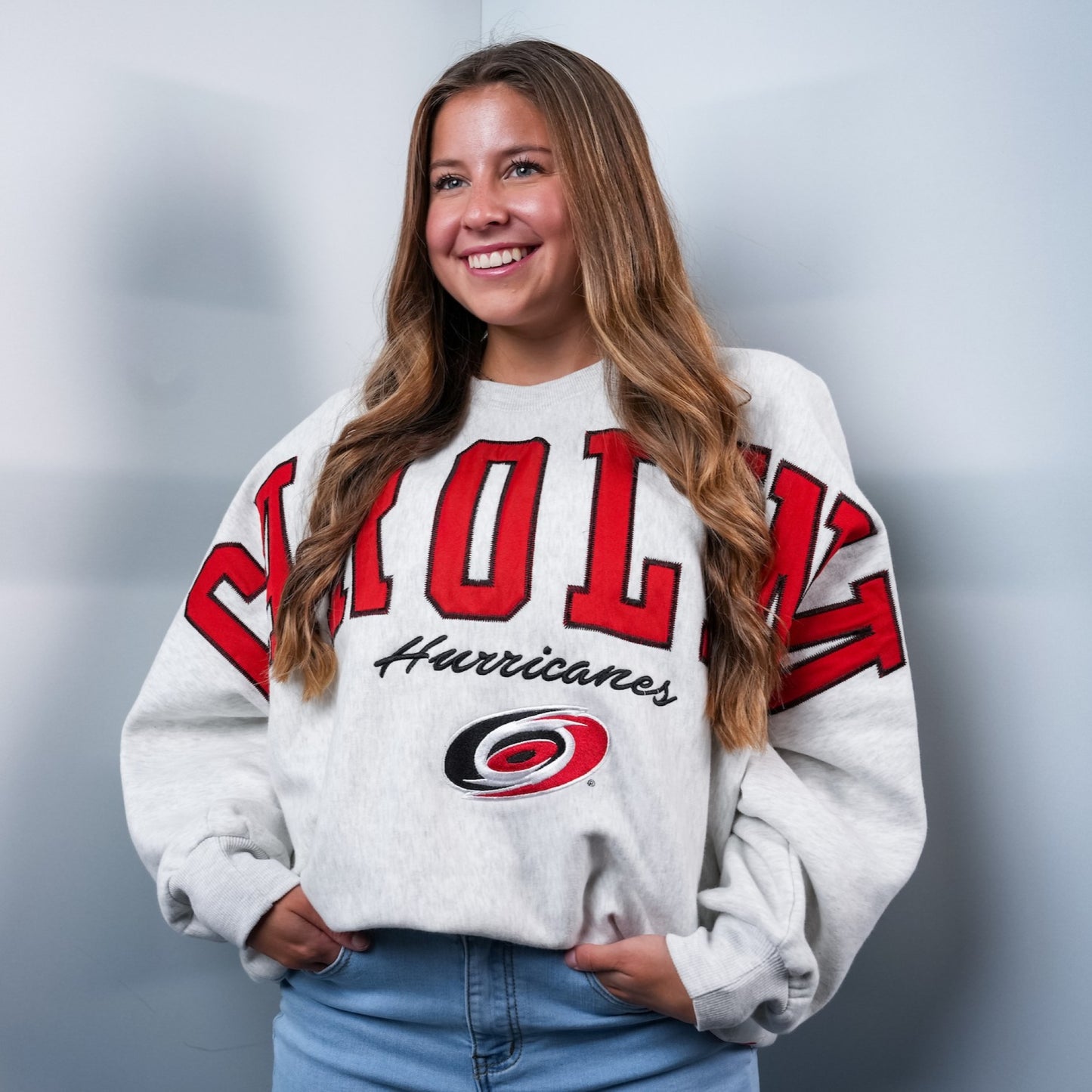 The sweater being worn by a model