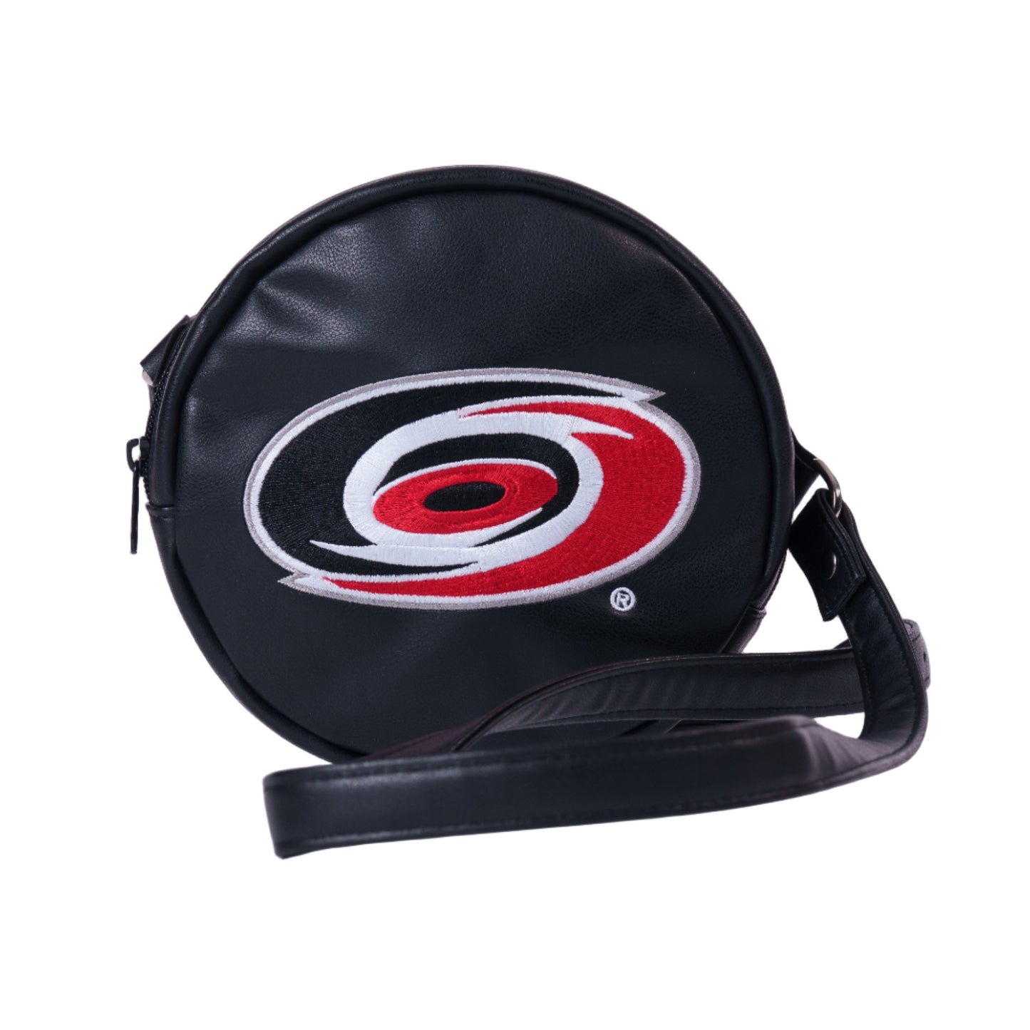 Black circular crossbody bag with Primary logo on front, black strap attached