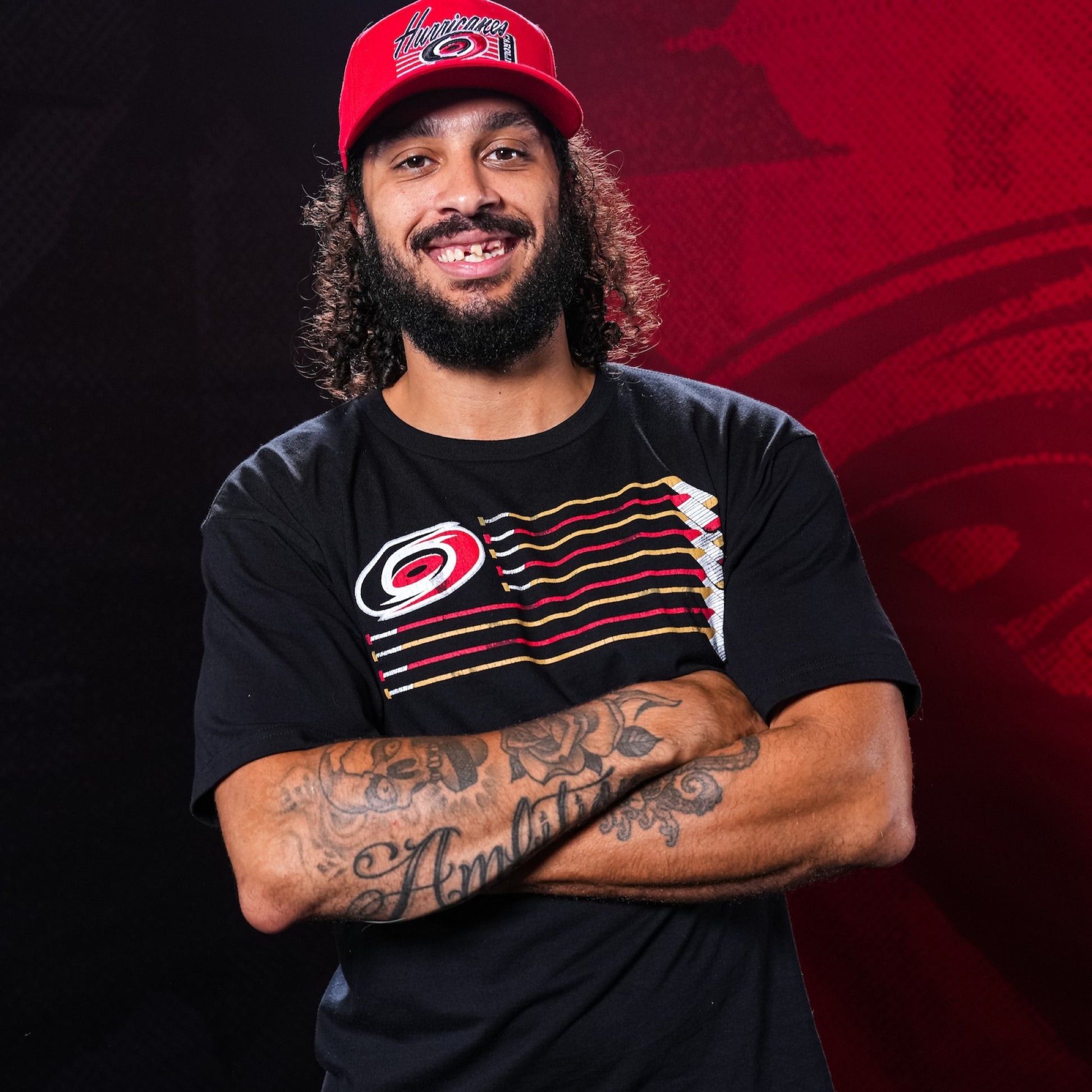 The t-shirt being worn by Hurricanes defenseman Jalen Chatfield