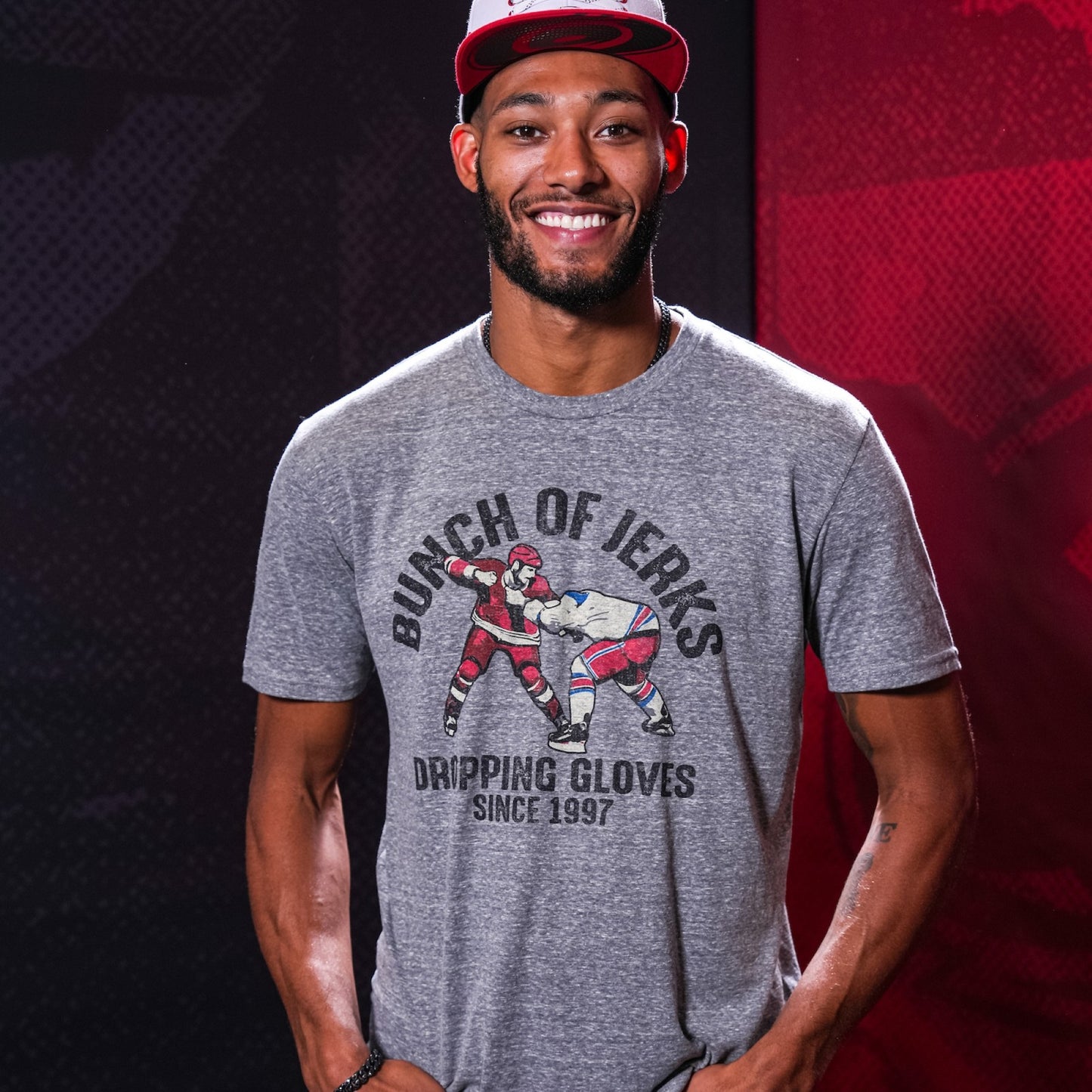 The t-shirt being worn by Hurricanes defenseman K'Andre Miller