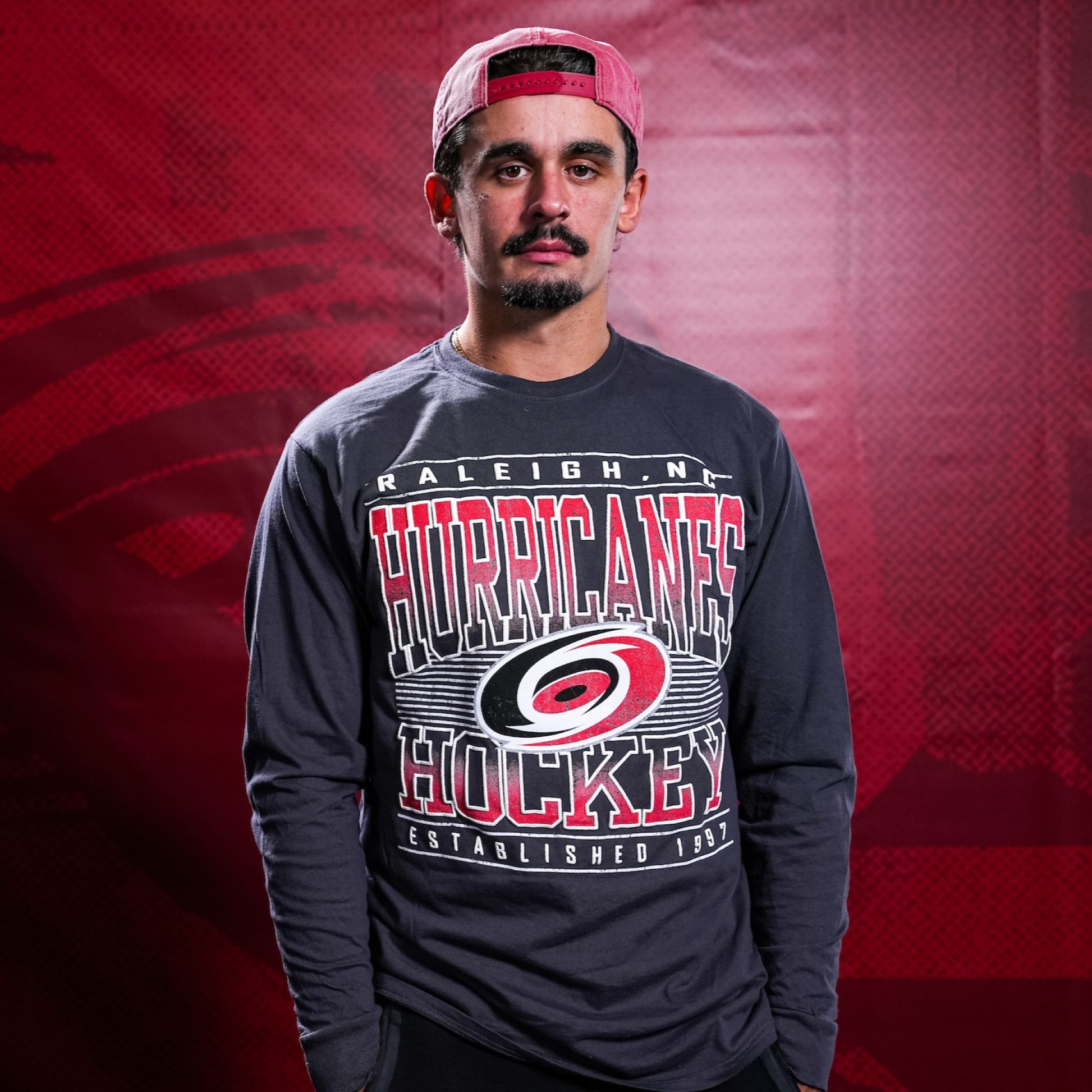 The longsleeve being worn by Hurricanes forward Seth Jarvis