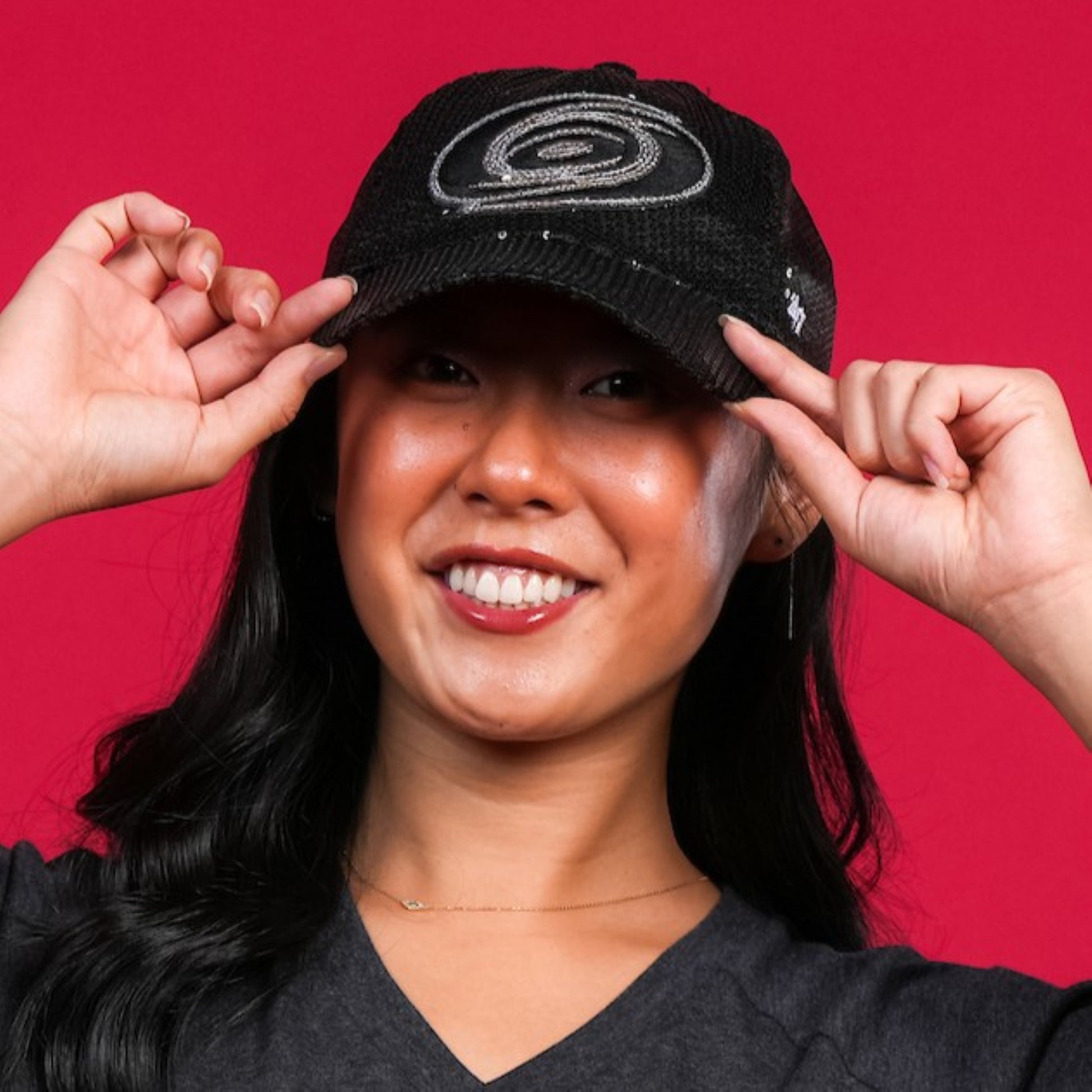 A close up of the hat being worn by a model