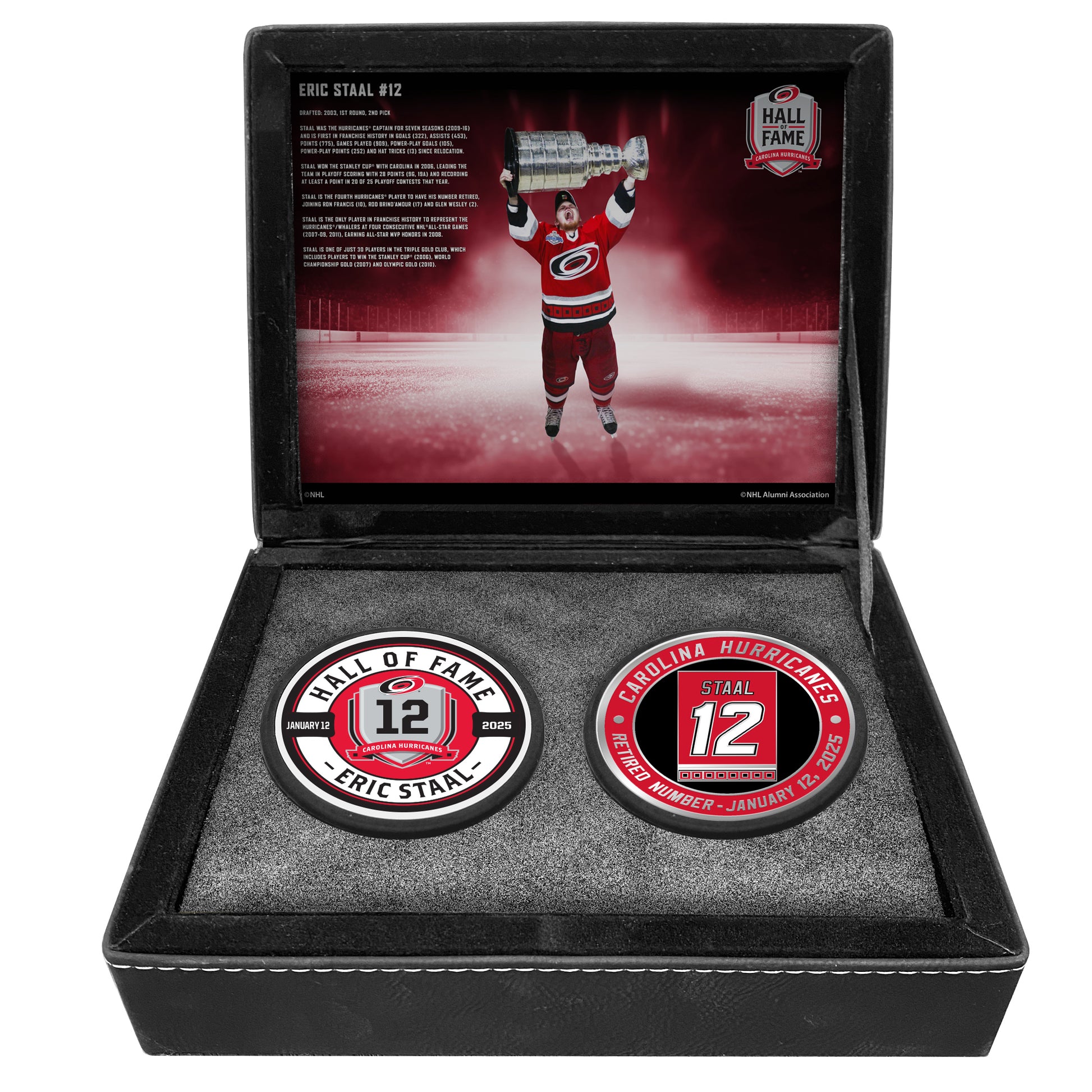The commemorative box open with both pucks and the boxart on display