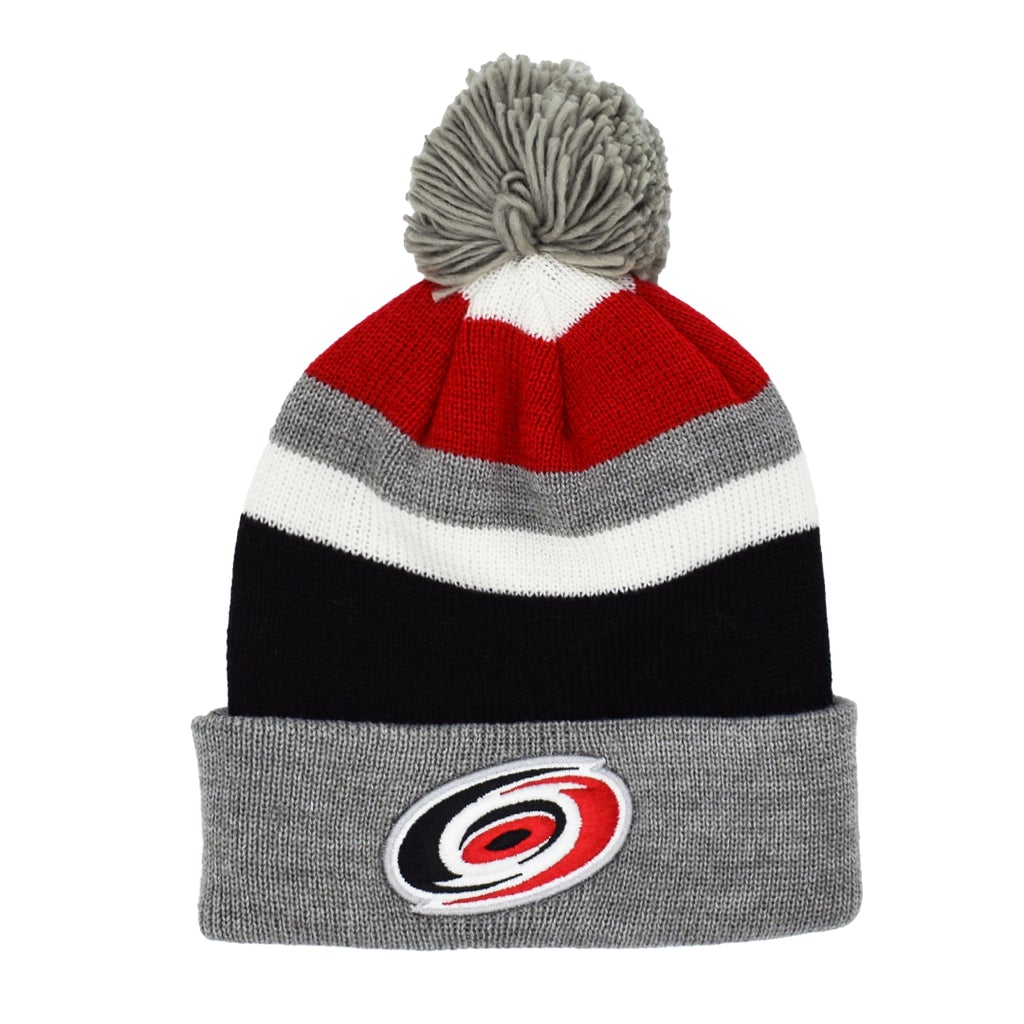 Front: Red,black,gray, and white beanie, gray cuff and pom, Primary logo on cuff