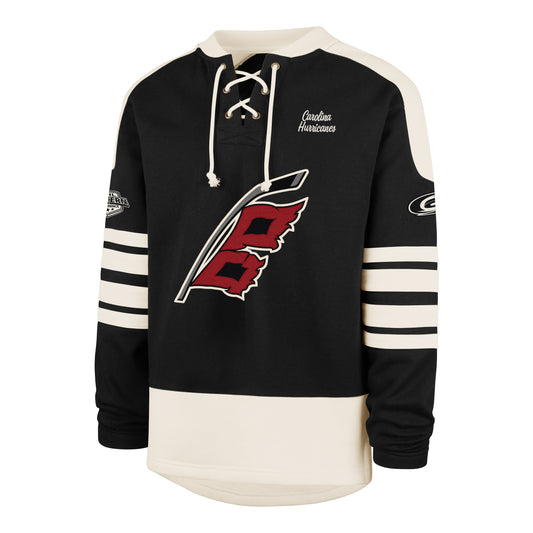 Front: Black lacer with white striping/shoulders, Flags logo on front, "Carolina Hurricanes" on left chest