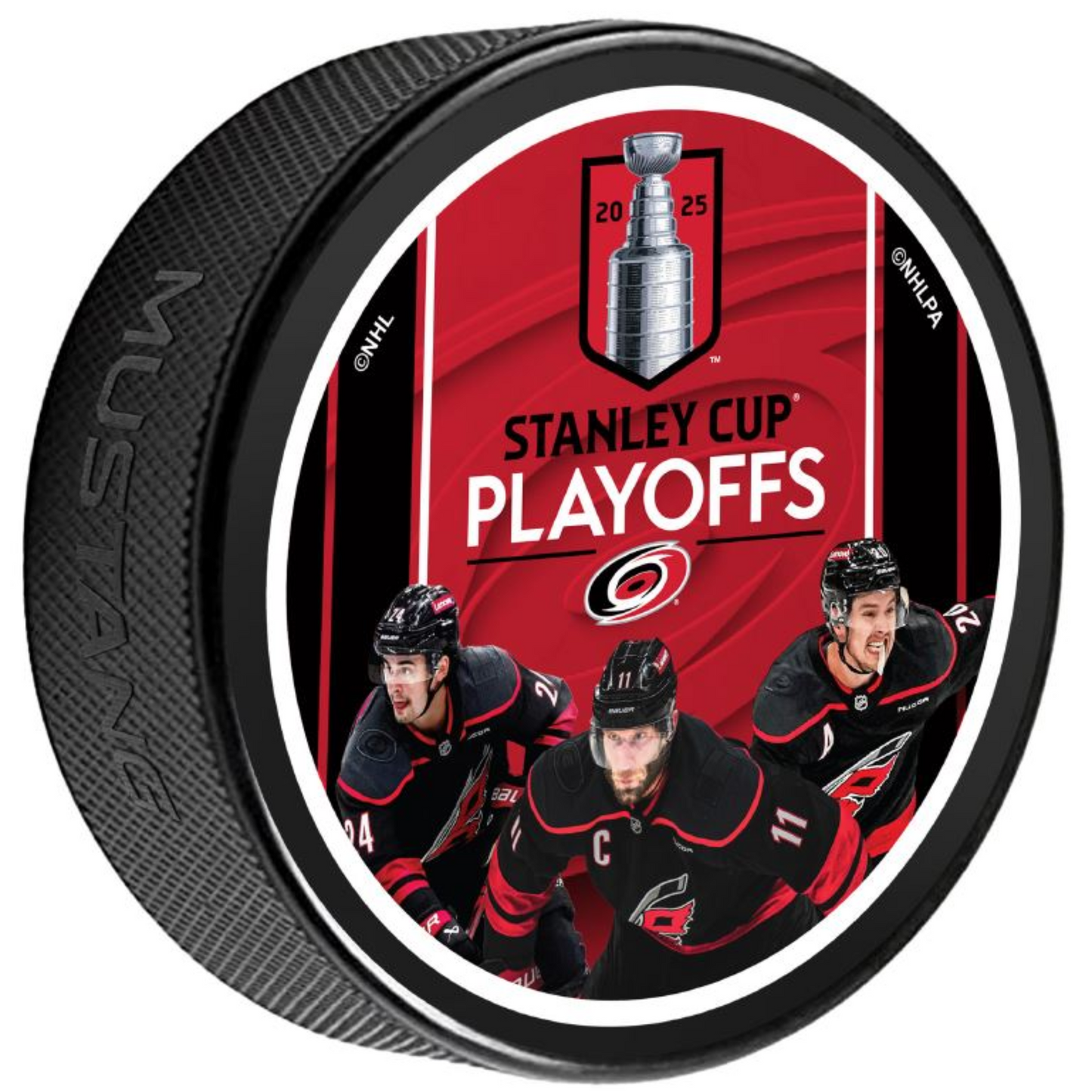 Puck with 2025 Stanley Cup Playoffs logo behind Hurricanes players Aho, Jarvis, and Staal