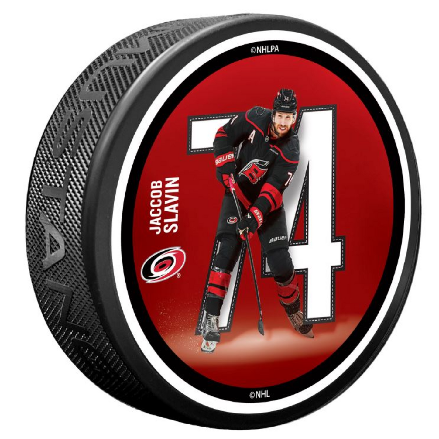Red puck with picture of Jaccob Slavin in front of his number 74 in white
