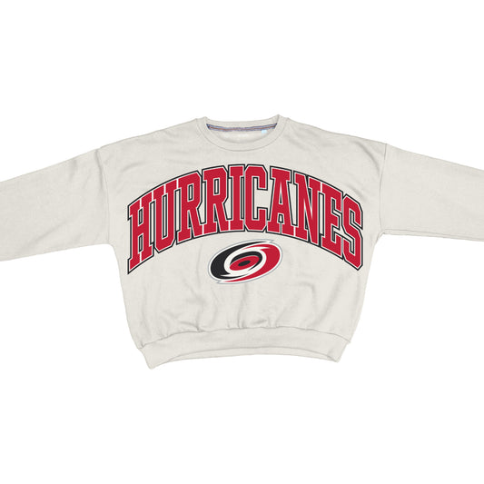 Oatmeal colored sweater, says Hurricanes arched in red across chest with primary logo