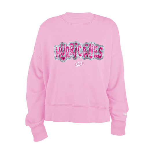 Front: Pink sweater, "Hurricanes" in pink with grey outline in sequin, whiteout Primary logo beneath