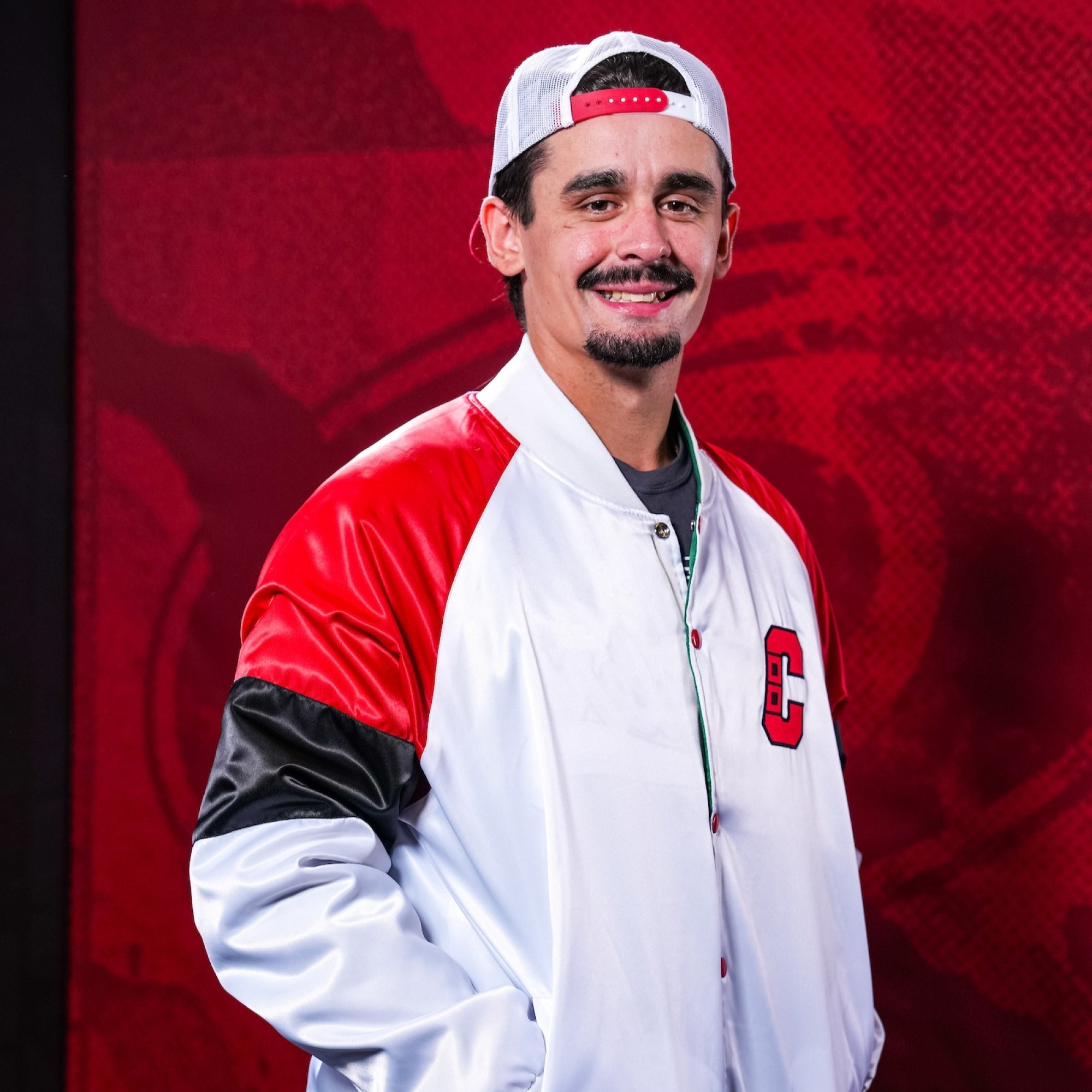 Hurricanes forward Seth Jarvis wearing Hurricanes merchandise