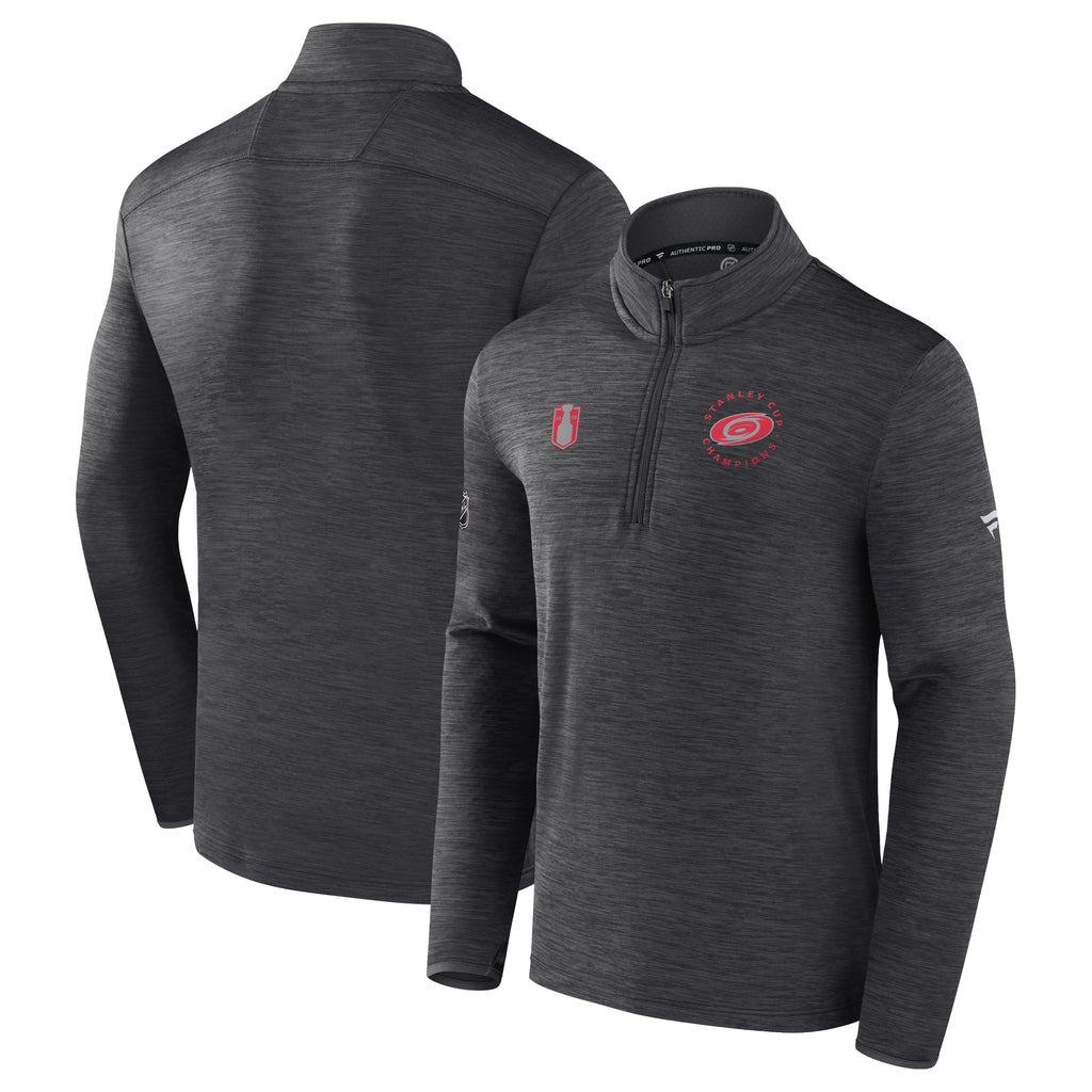 Front/Back: Dark gray quarter-zip with red artwork on the front