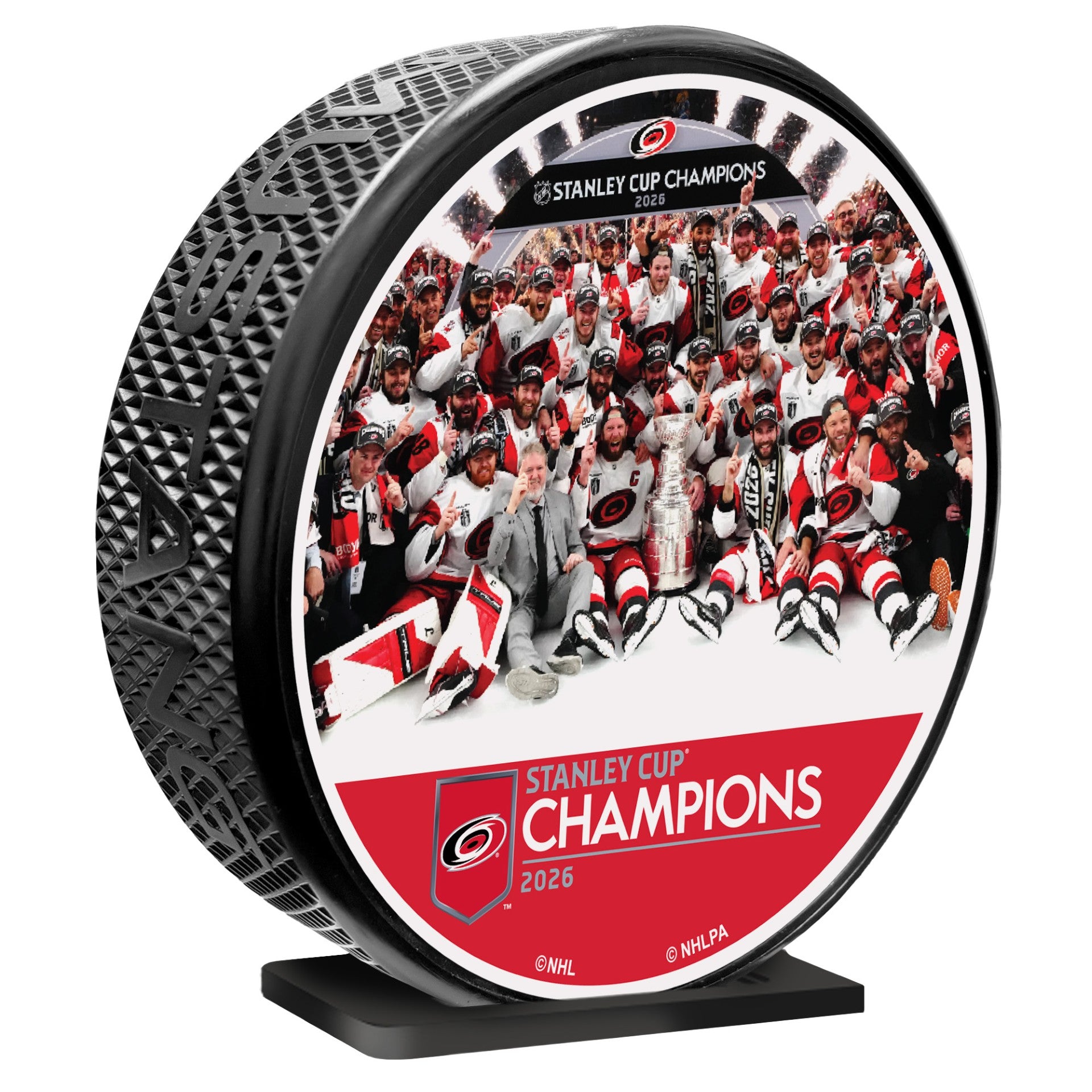 Mega puck, "STANLEY CUP CHAMPIONS" wordmark at bottom below Stanley Cup Team Photo