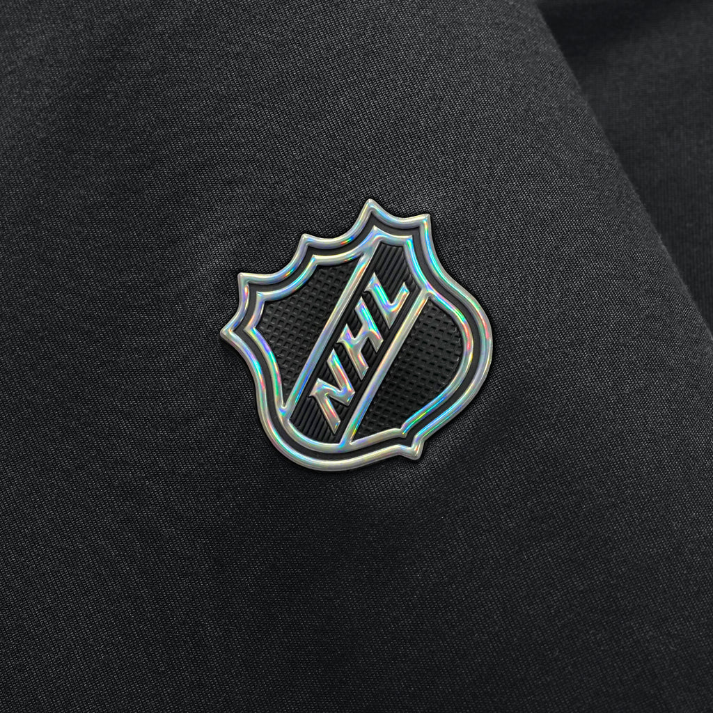 Close up of holographic & textured NHL Shield on right sleeve