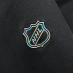 Close up of holographic & textured NHL Shield on right sleeve