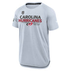 Front: "CAROLINA HURRICANES" across chest in red/black with Primary logo, Stanley Cup logo on right chest