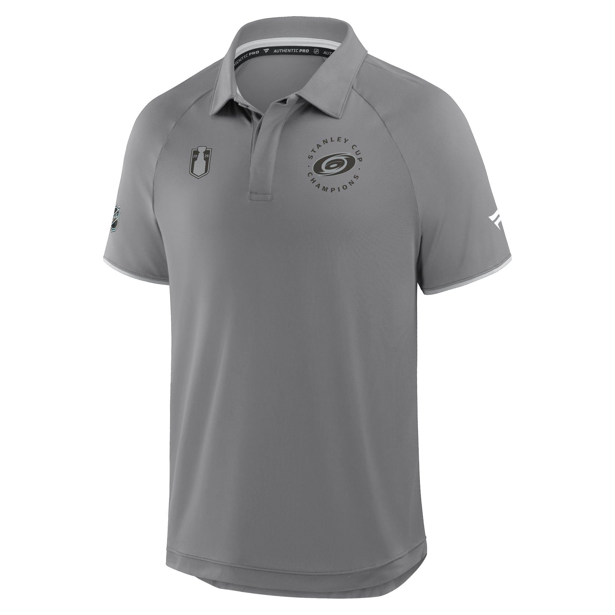 Front: Grey/black Primary logo on left chest, "STANLEY CUP CHAMPIONS" around logo, Cup logo right chest