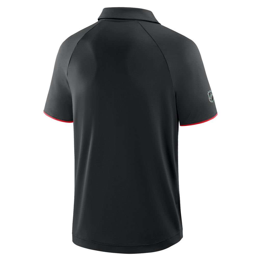 Back: Black polo, Fanatics logo on left sleeve, NHL Shield on right sleeve