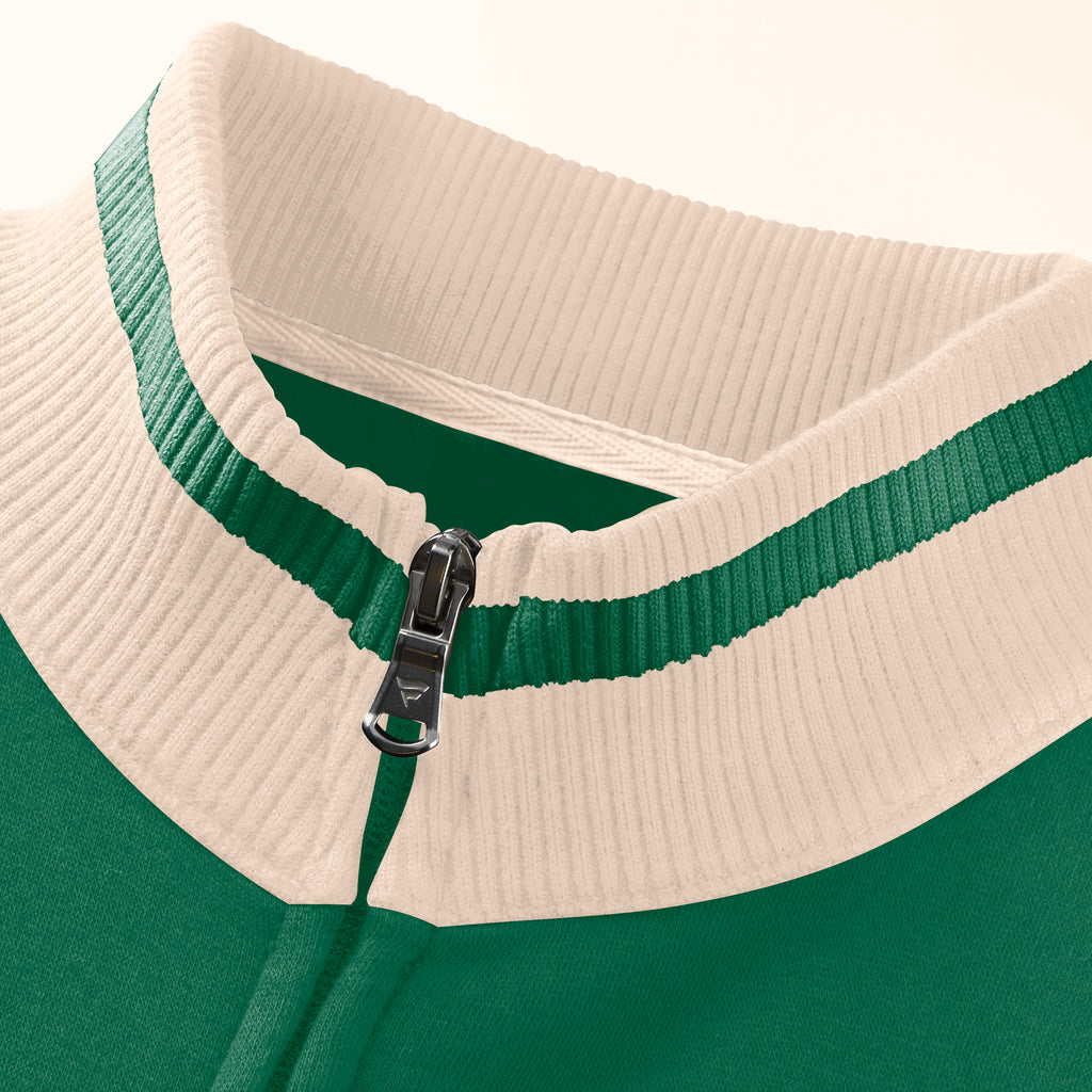 Close up of the cream/green neckline and zipper