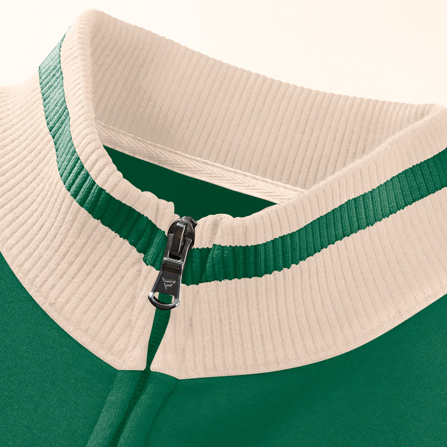 Close up of the cream/green neckline and zipper