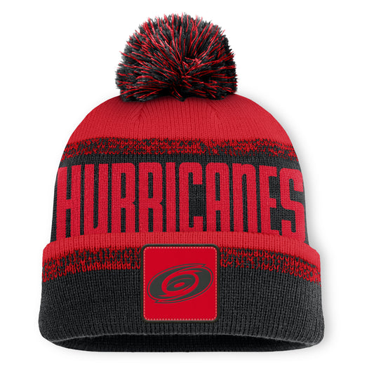 Front: Red beanie, black accent; square red patch with blackout Primary logo on cuff