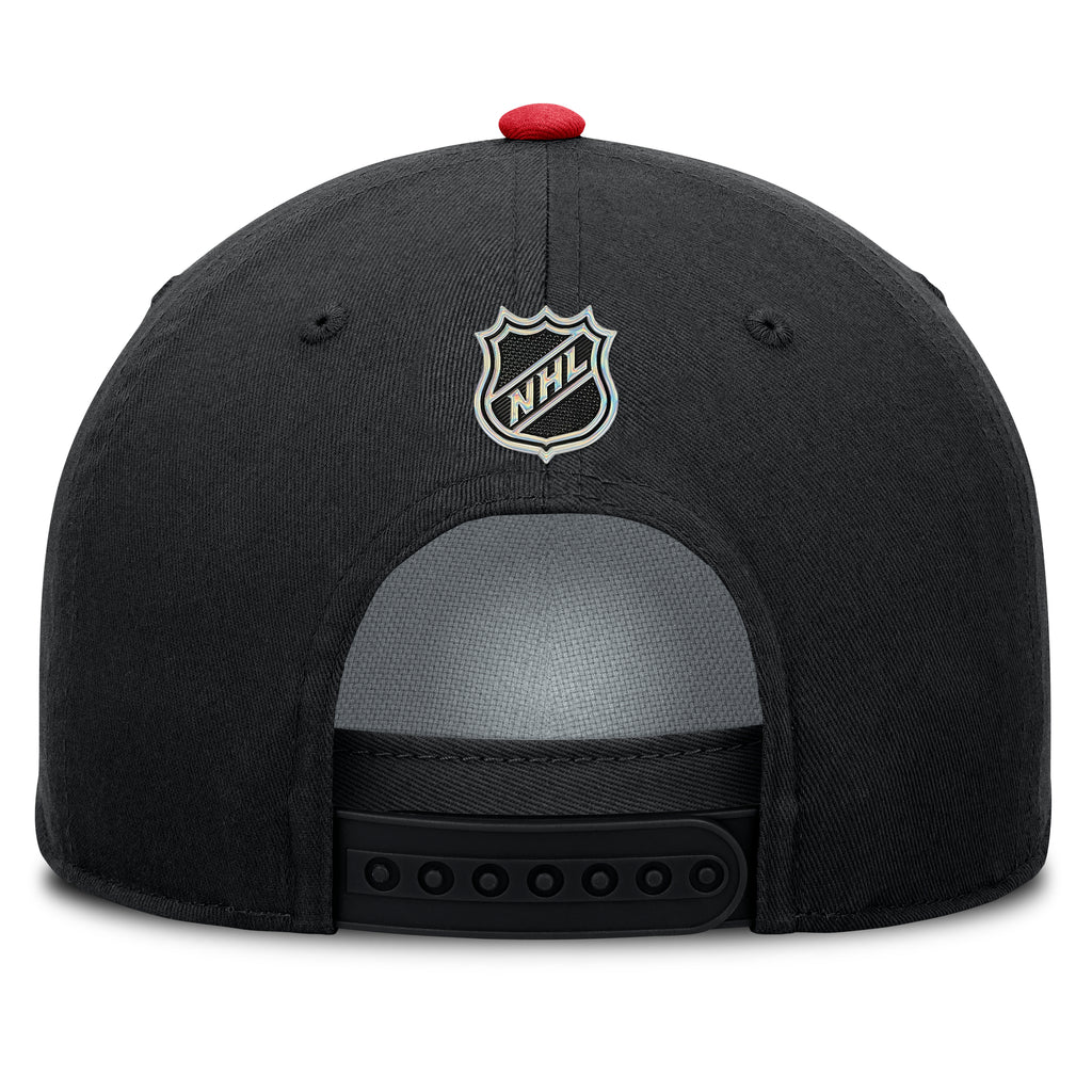 Back: Black back, black snapback straps, NHL Shield above straps, red crown