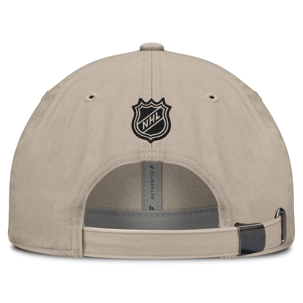 Back: Beige adjustable strap with metal clasp, NHL Shield above strap