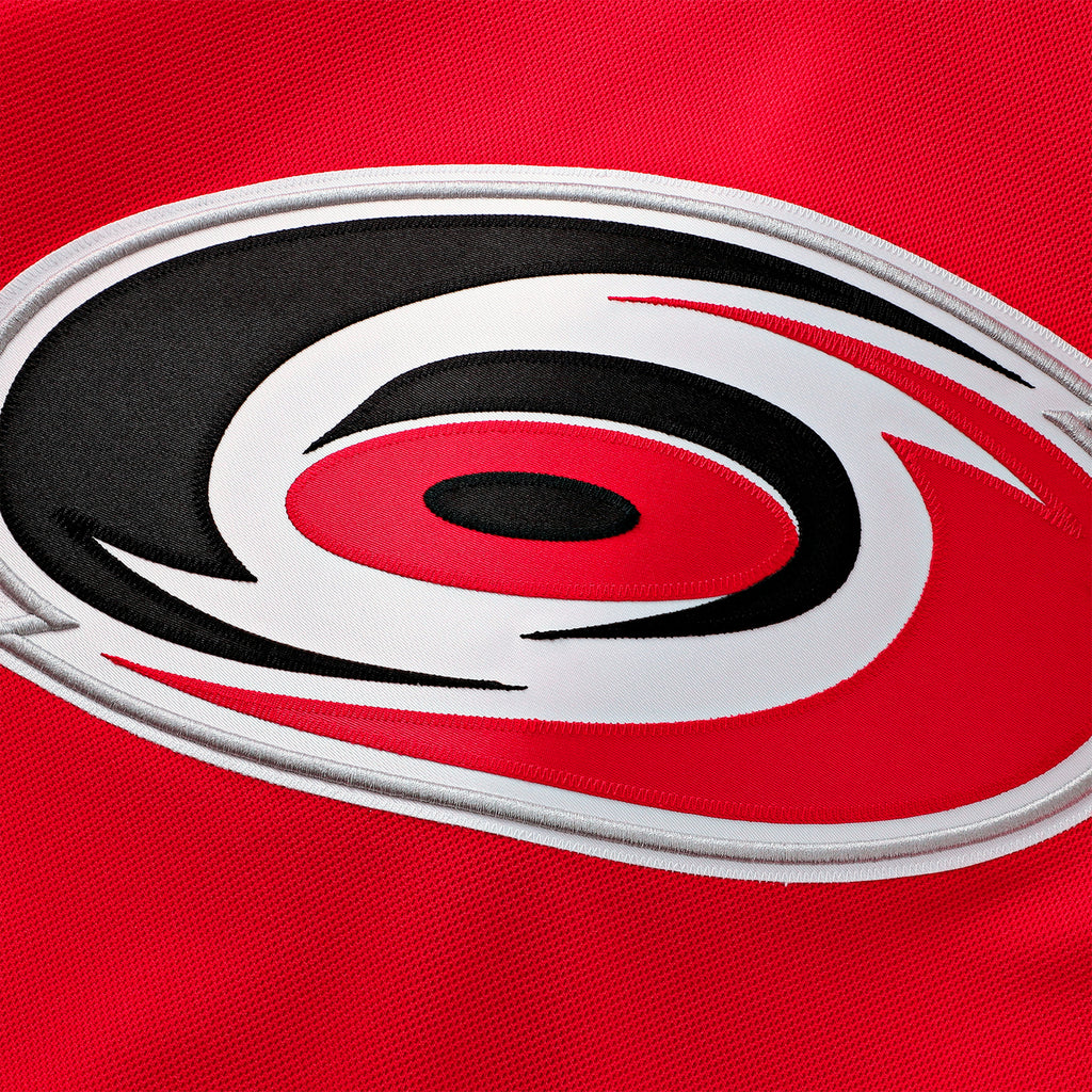 Close up of the Primary logo crest on the front