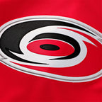 Close up of the Primary logo crest on the front