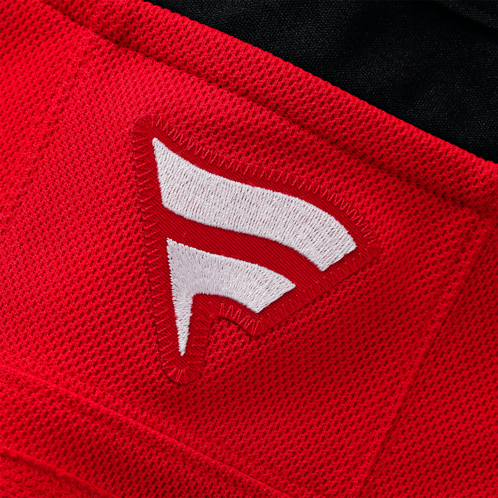 Close up of the white Fanatics logo on the back neckline