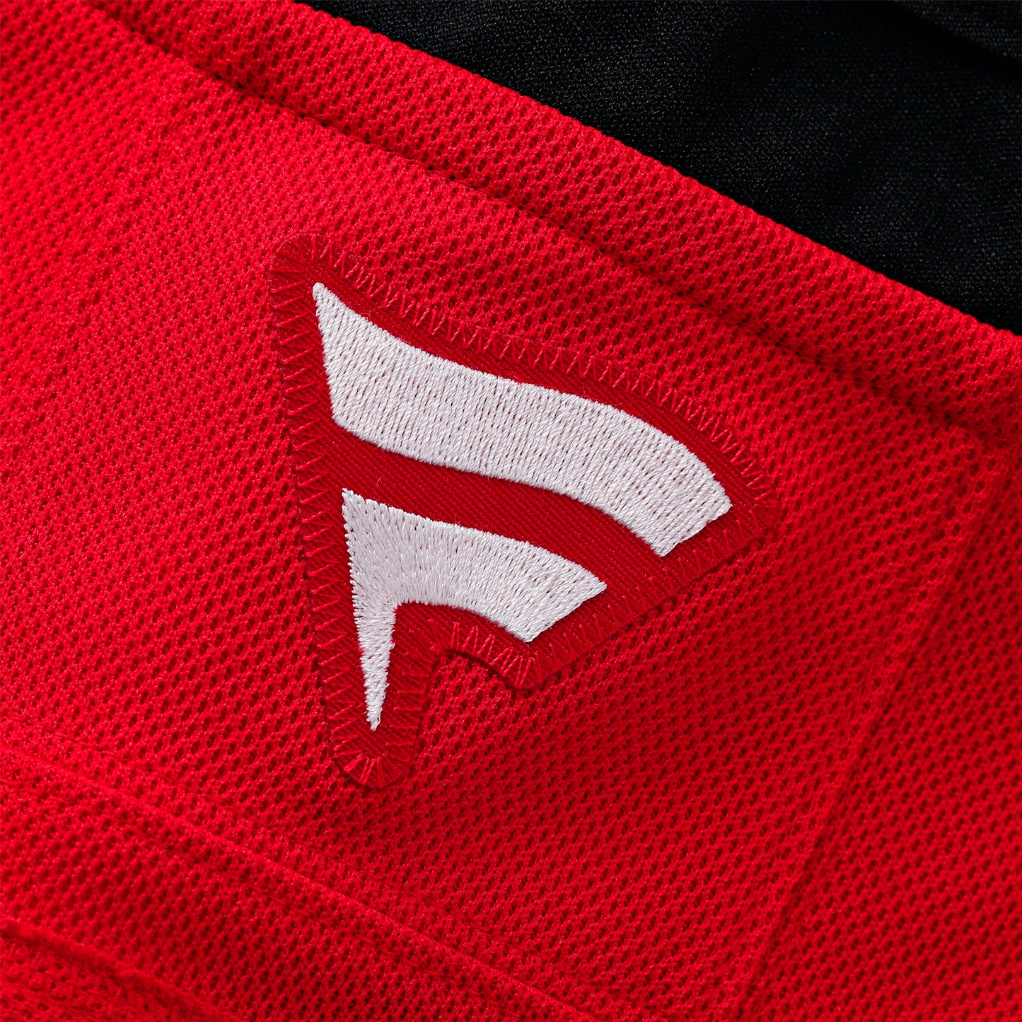 Close up of the white Fanatics logo on the back neckline