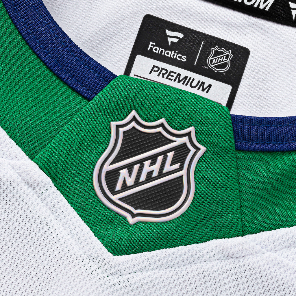 Close up of the holographic NHL Shield at the neckline on front