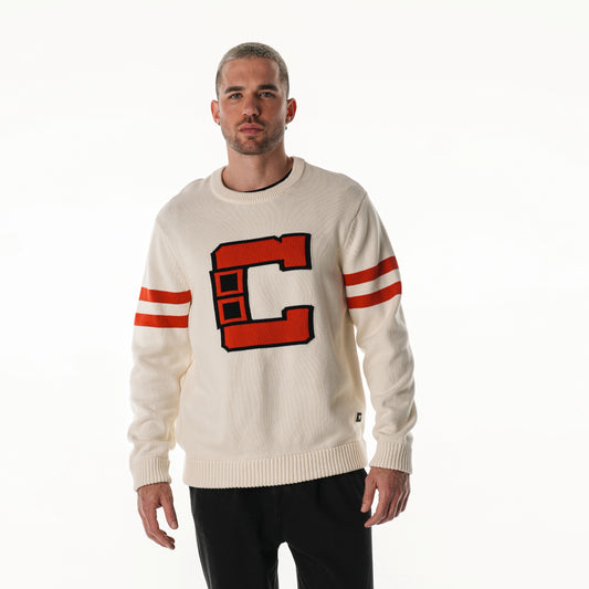 Front: Cream sweater, Hurricanes Collegiate "C" on front, red stripes on sleeves