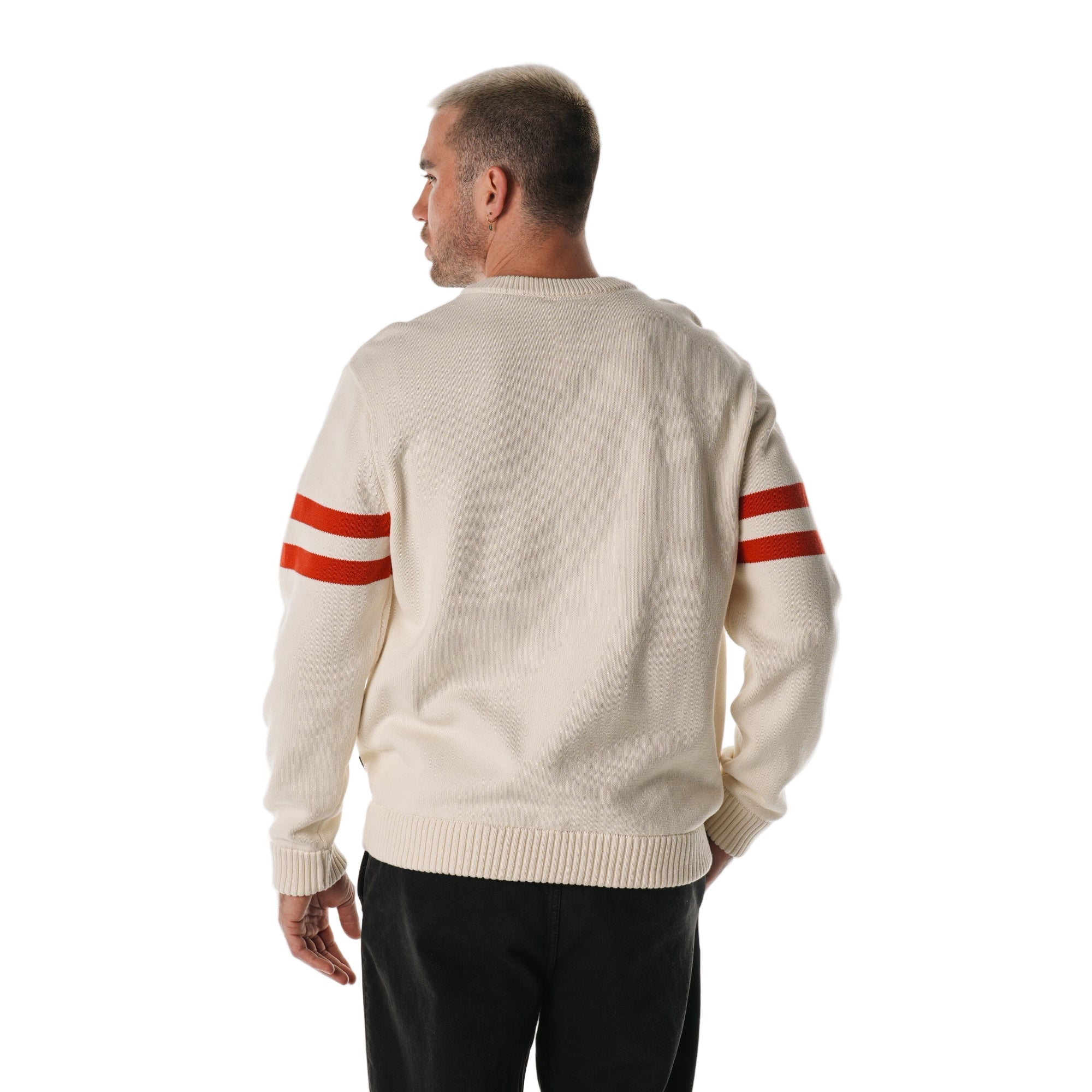 Back: Cream sweater, red stripes on sleeves