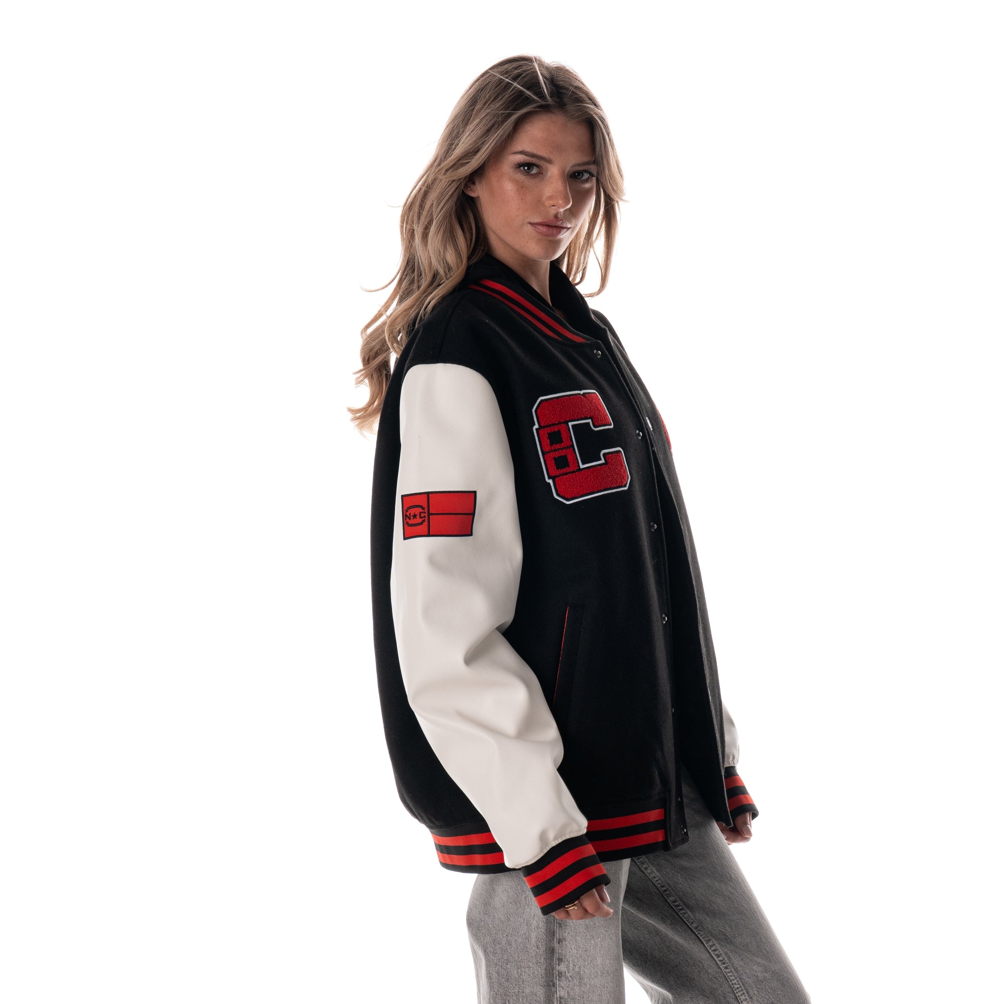 Right: Black varsity jacket, Red State Flag on right sleeve