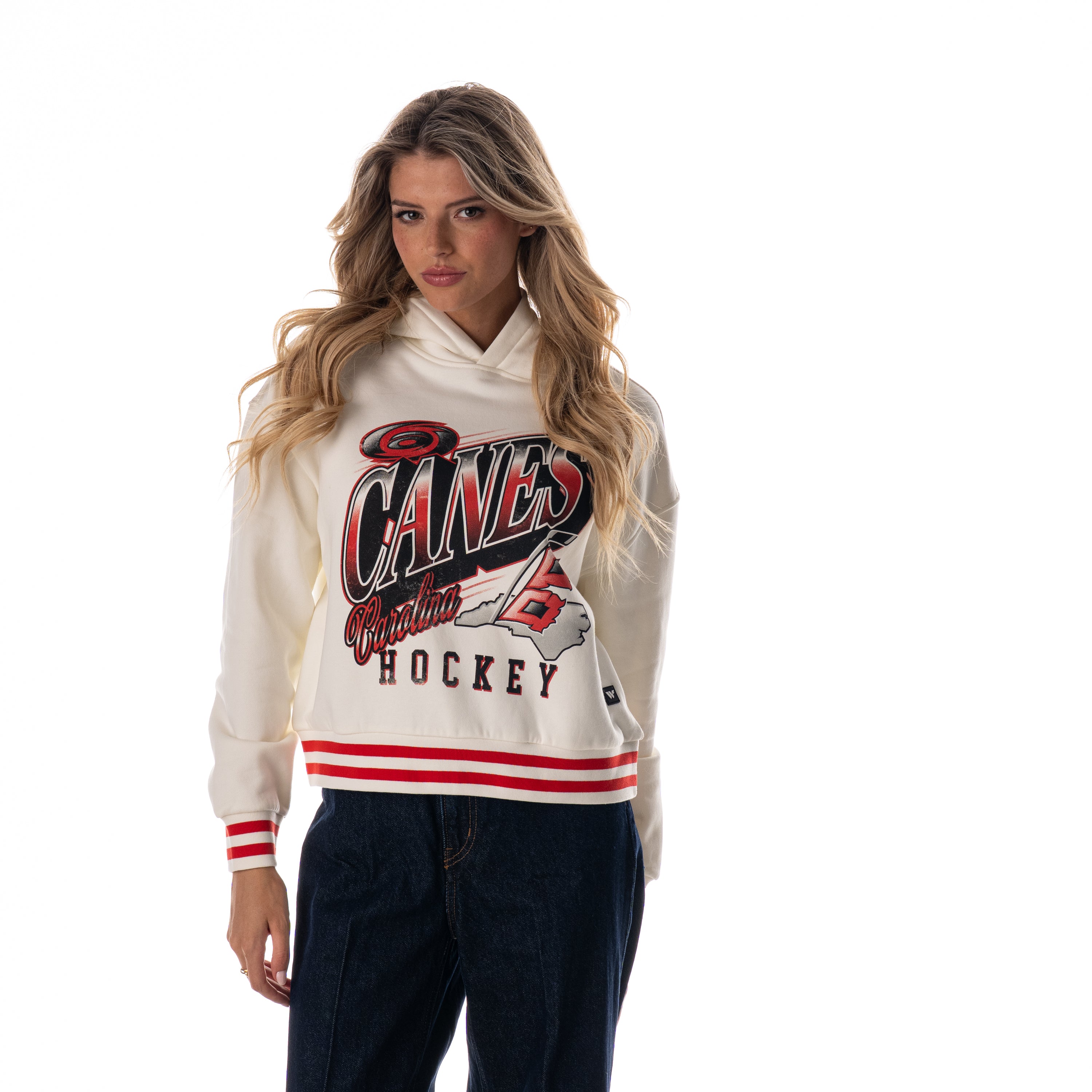 Front: White cropped hood with red striping, "CANES HOCKEY" graphic with logos on front