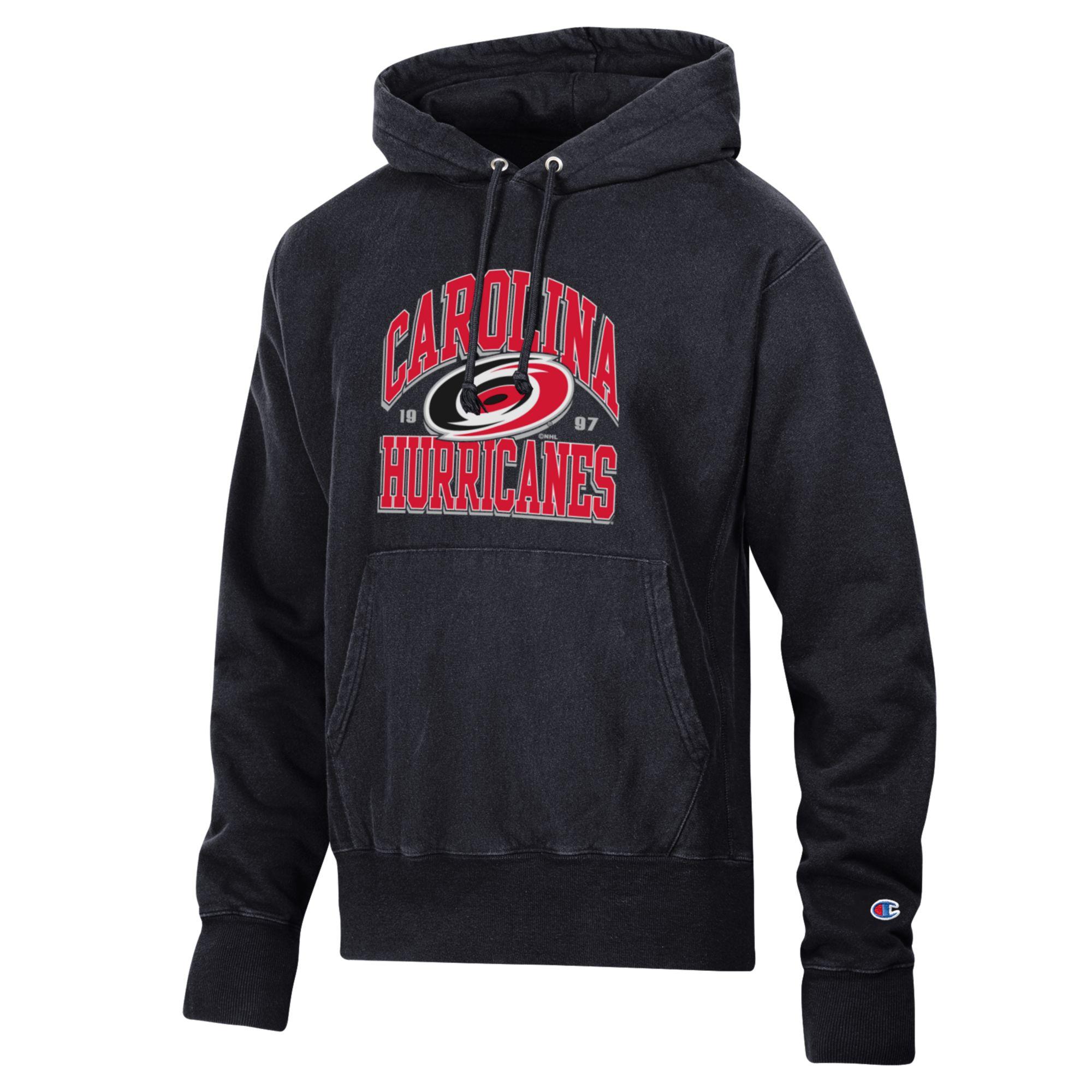 Black hood with arched red and white graphic, says Carolina Hurricanes with primary logo