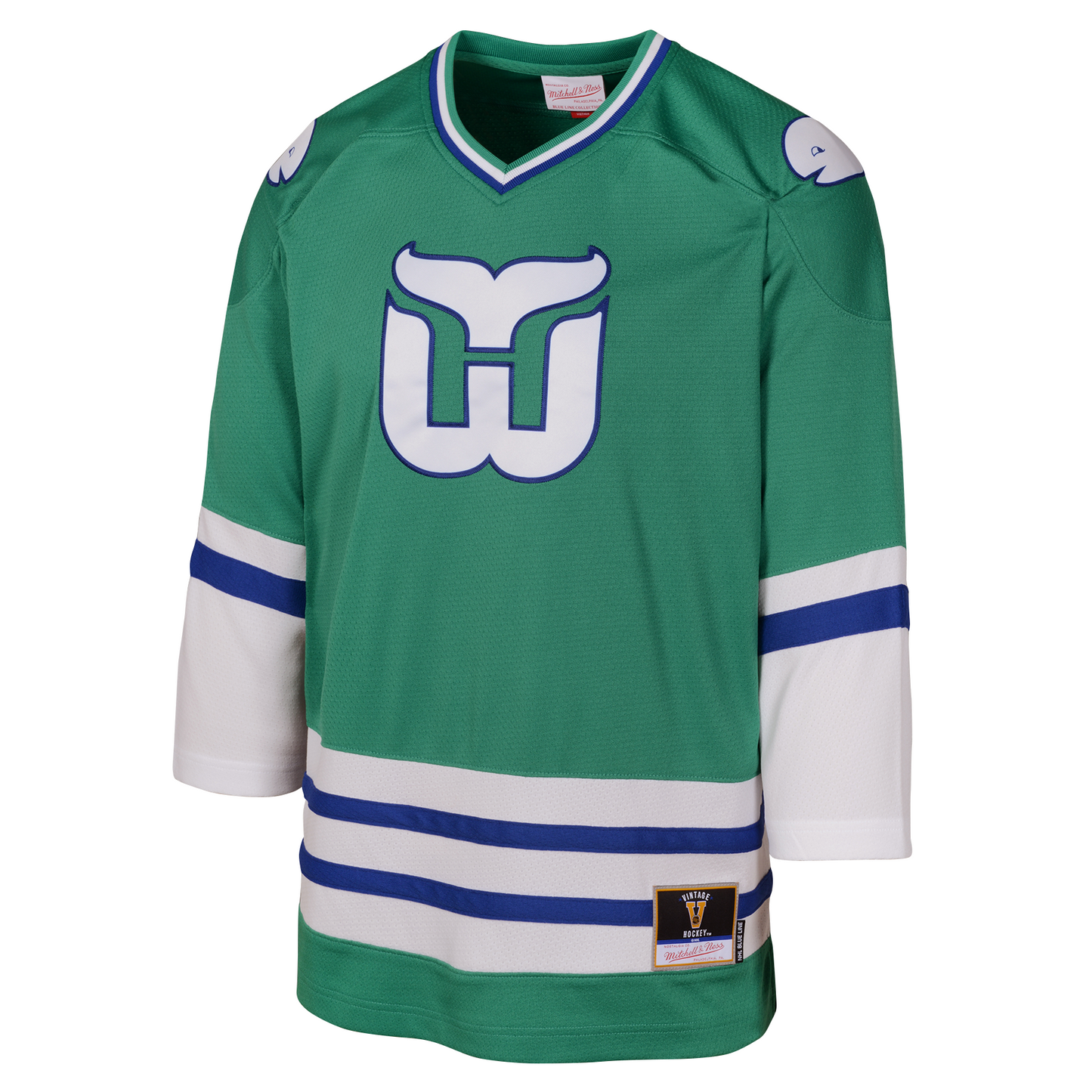 Front: Green jersey with white and blue striping, Whalers logo on front