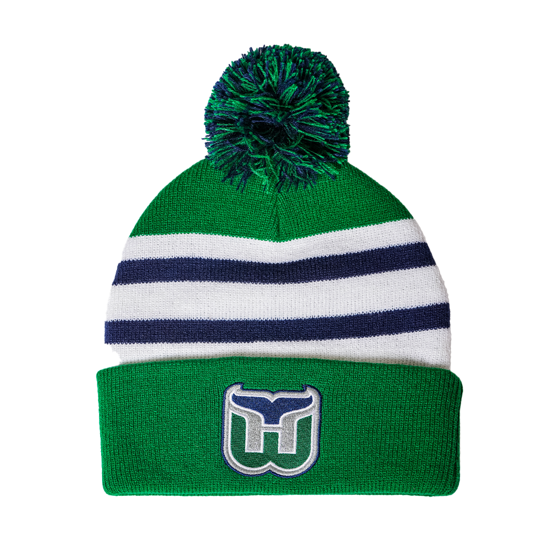 Green cuffed knit with white and blue striping, Whalers logo on cuff, green and blue pom