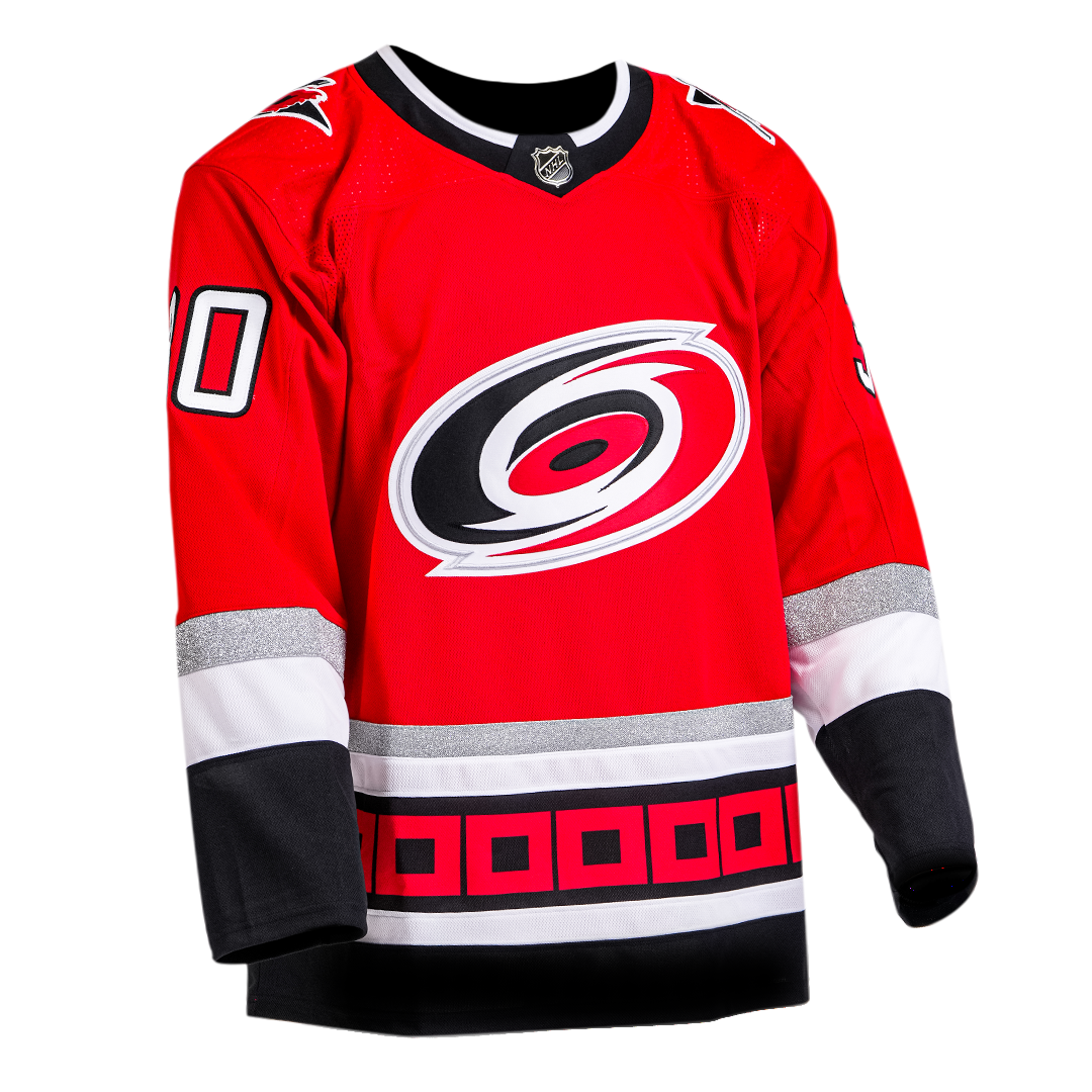 Front: Hurricanes anniversary jersey with Hurricanes logo and 30 on sleeves