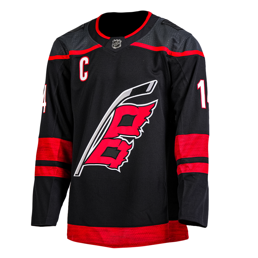 Front: Black jersey with Hurricanes flag logo & 'C' on front and 14 on sleeves
