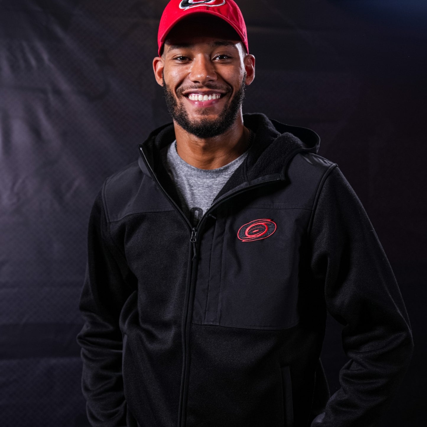 The jacket being worn by Hurricanes defenseman K'Andre Miller