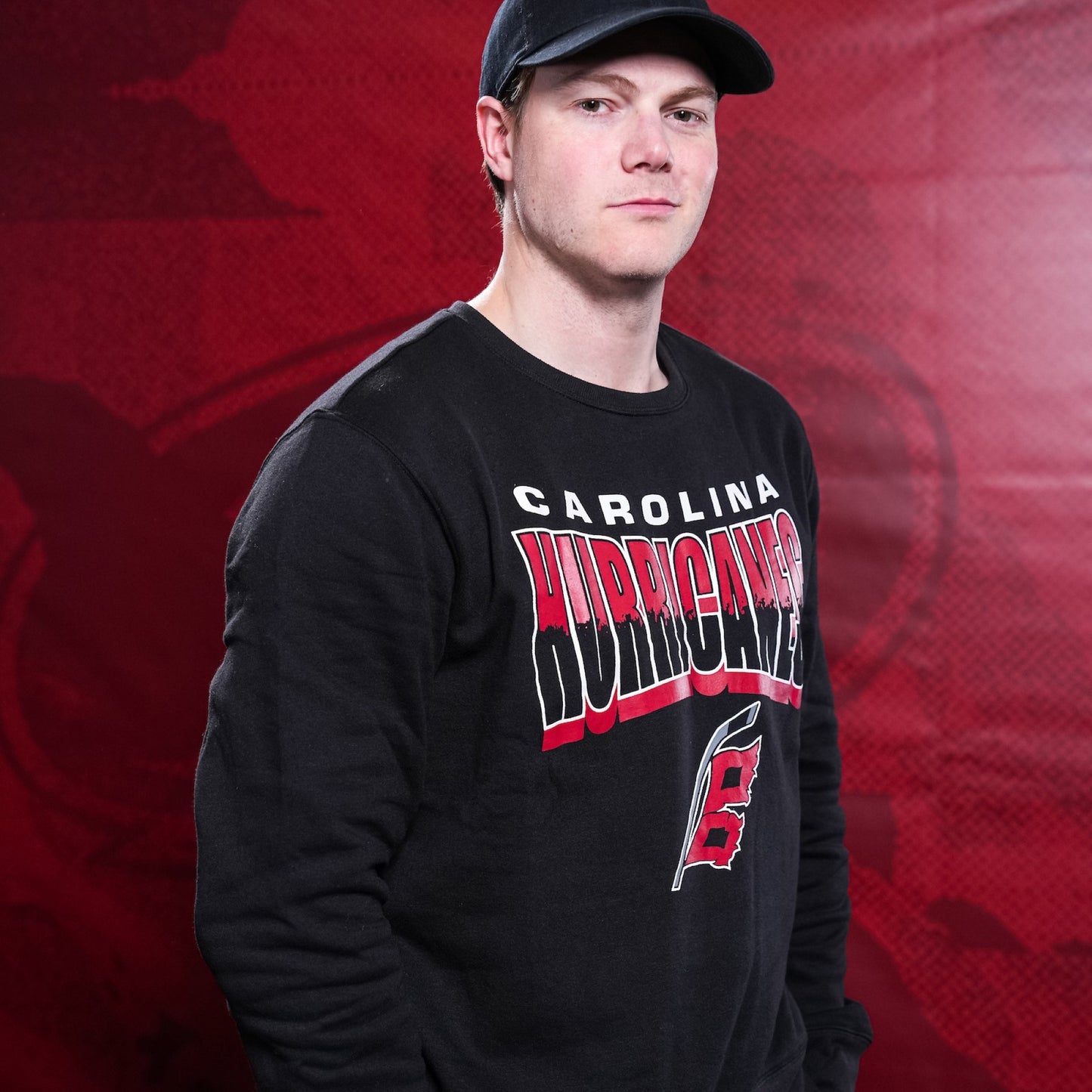 The crewneck being worn by Hurricanes forward Eric Robinson