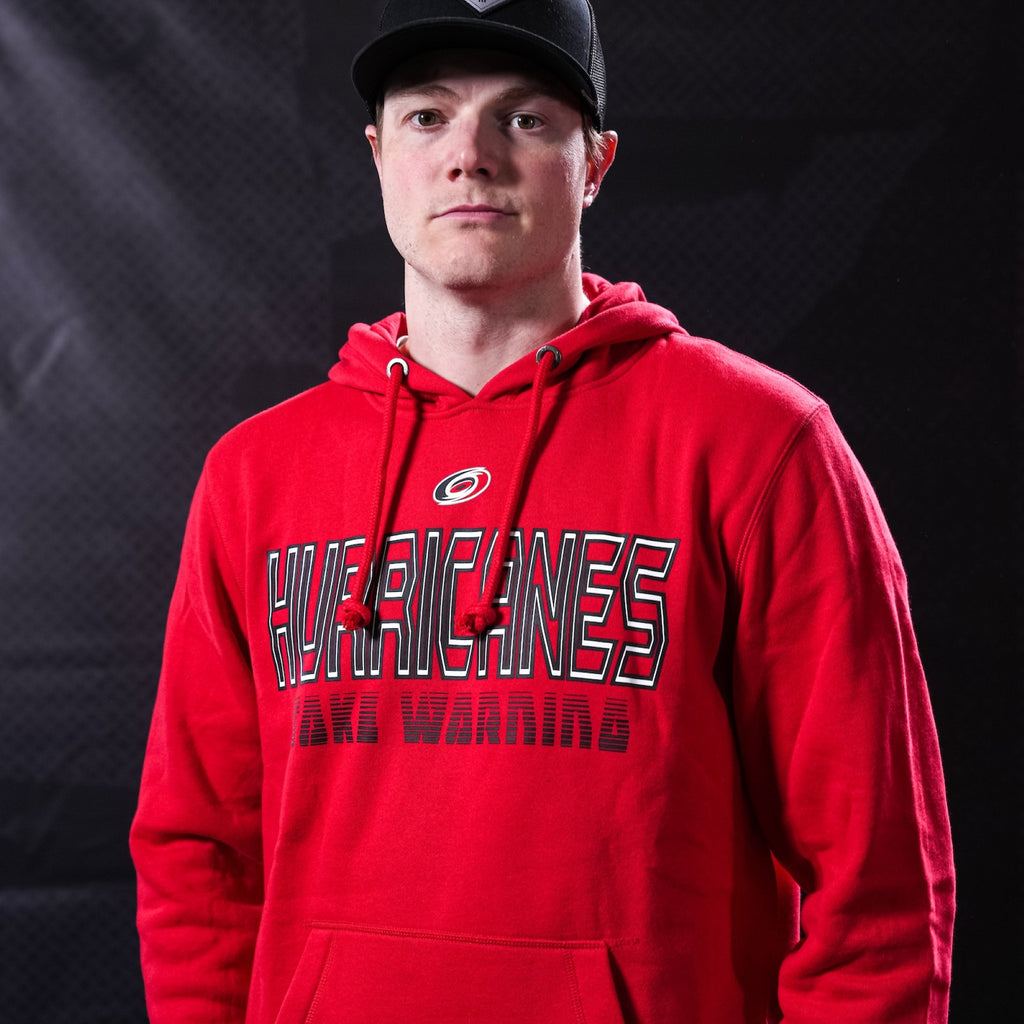 The hoodie being worn by Hurricanes forward Eric Robinson