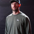 Ollive green sweater, Pucky logo on left chest, worn by Jaccob Slavin in photo