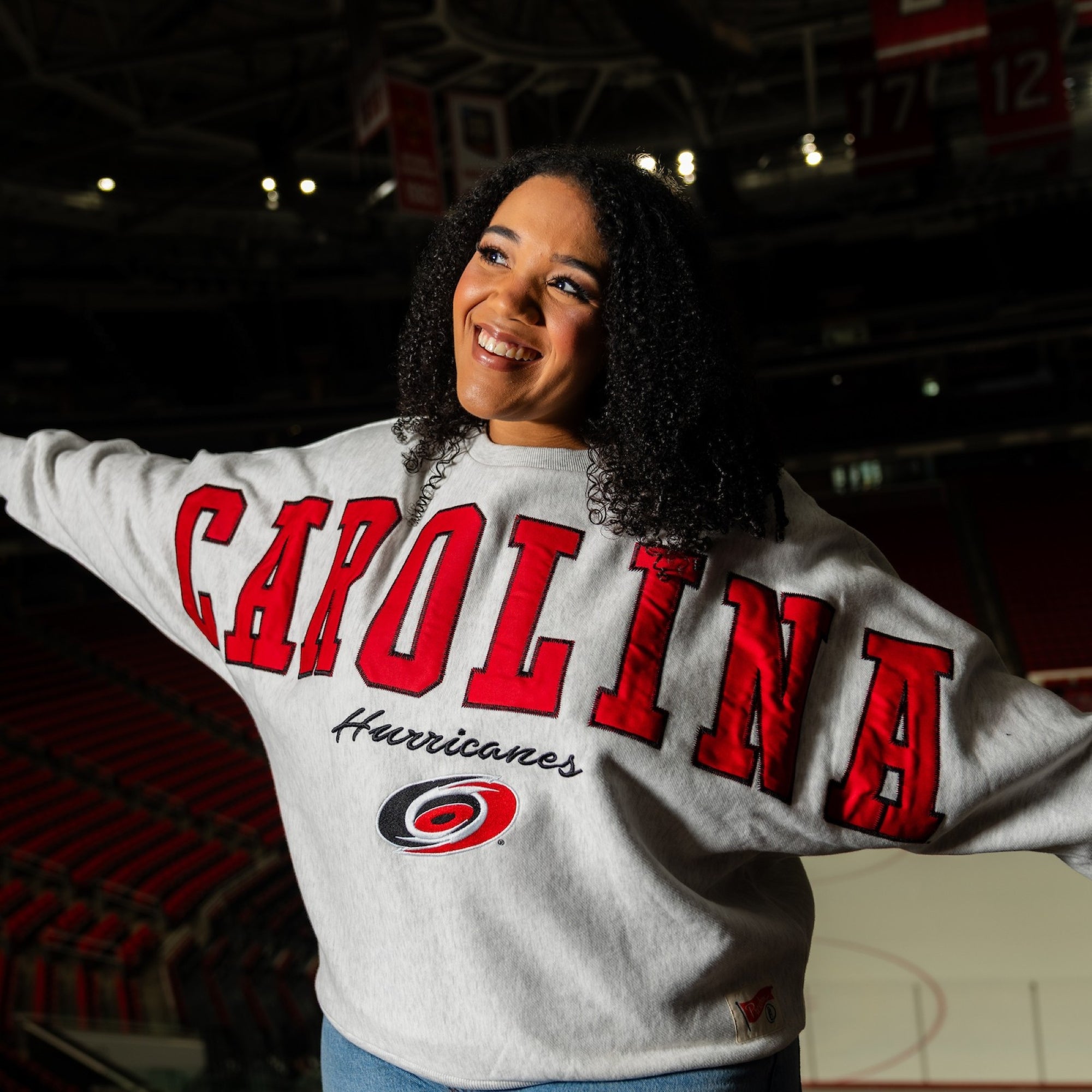 The crew being worn by a model in the Lenovo Center